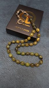 تسبیح کهربا زرد رگه دار 